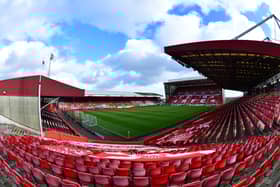 Warnock has taken temporary charge at Pittodrie.