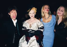 Left to right: Rolling Stones singer Mick Jagger, fashion designer Vivienne Westwood, Jerry Hall and her daughter Elizabeth Jagger at a Westwood tribute by Moet & Chandon at the Victoria and Albert Museum, London, 17th November 1998. (Photo by Dave Benett/Hulton Archive/Getty Images) 