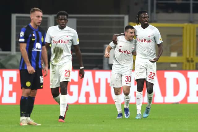 Oscar Gloukh celebrates scoring in the UEFA Champions League against Inter Milan