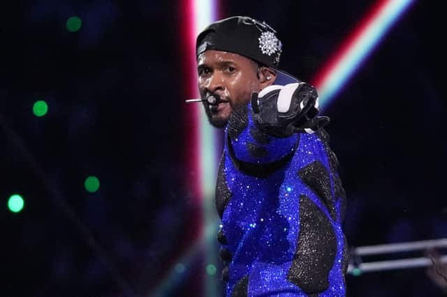 US singer-songwriter Usher performs during Apple Music halftime show of Super Bowl LVIII between the Kansas City Chiefs and the San Francisco 49ers at Allegiant Stadium in Las Vegas, Nevada on February 11, 2024. (Photo by TIMOTHY A. CLARY/AFP via Getty Images)