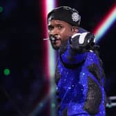 US singer-songwriter Usher performs during Apple Music halftime show of Super Bowl LVIII between the Kansas City Chiefs and the San Francisco 49ers at Allegiant Stadium in Las Vegas, Nevada on February 11, 2024. (Photo by TIMOTHY A. CLARY/AFP via Getty Images)