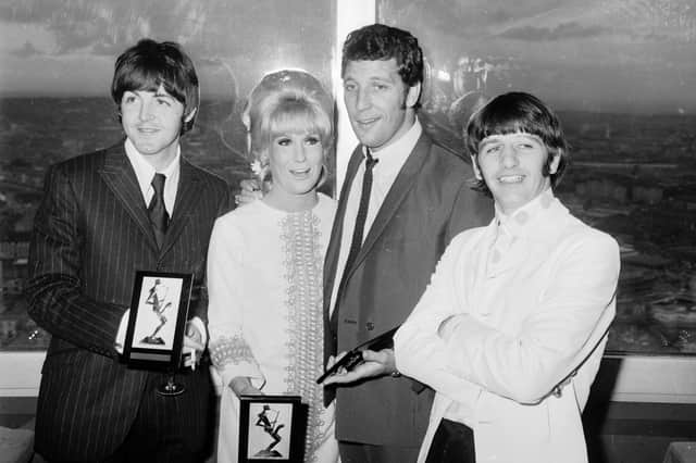 Paul McCartney, Dusty Springfield, Tom Jones and Ringo Starr with their awards at the Melody Maker Pop Poll luncheon in the Post Office Tower restaurant on September 13 1966 . (Photo by Terry Disney/Express/Getty Images)