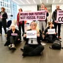 Extinction Rebellion protesters occupy the lobby of the Talbot building