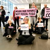 Extinction Rebellion protesters occupy the lobby of the Talbot building