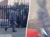 Chilling footage shows 'brazen' hooded man walking along street with huge knife in hand near primary school
