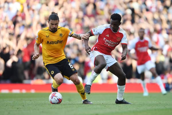 Eddie Nketiah and Ruben Neves in action during Wolves vs Arsenal
