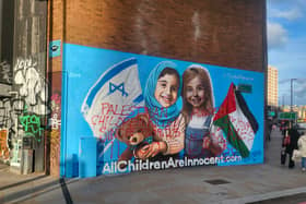 A new Israel-Palestine peace mural painted on a street in Shoreditch has been defaced 