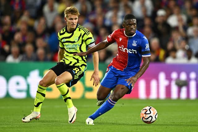 Cheick Doucoure in action against Arsenal