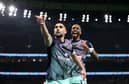 Neal Maupay on the wind up for Brentford.