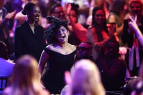 Raye reacts as she goes to collect her award for the song of the year for Escapism (featuring 070 Shake) during Brit Awards 2024 ceremony.