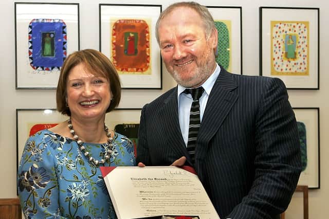 Tessa Jowell presents music promoter Vince Power with an Honorary CBE in London in 2006.  
