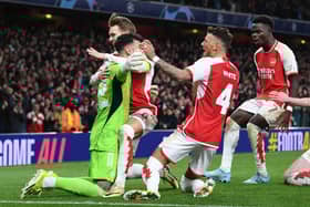 Arsenal celebrate after David Raya saves match-winning penalty in last 16 penalty shoot-out