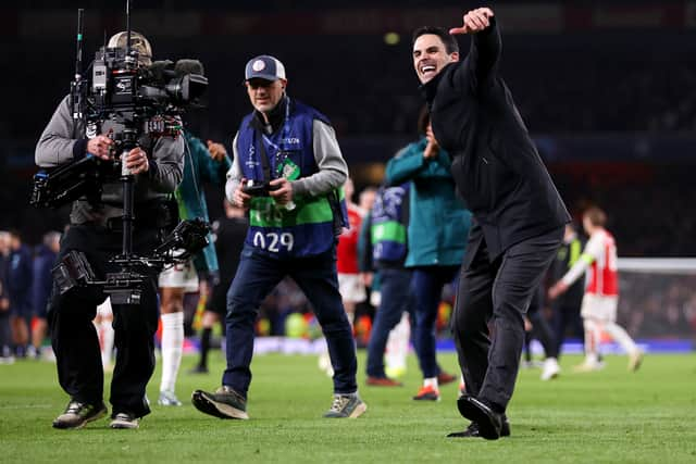 Mikel Arteta celebrates beating Porto on Tuesday night.