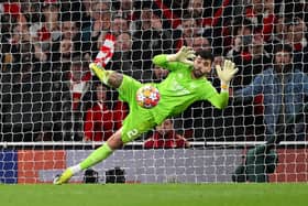 David Raya in action for Arsenal against Porto, saving match-winning penalty.