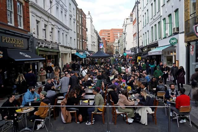 People socialising in Soho aftrer lockdown restrictions eased in April 2021. 