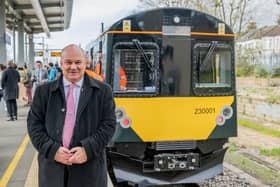 GWR Managing Director Mark Hopwood beside the battery powered train