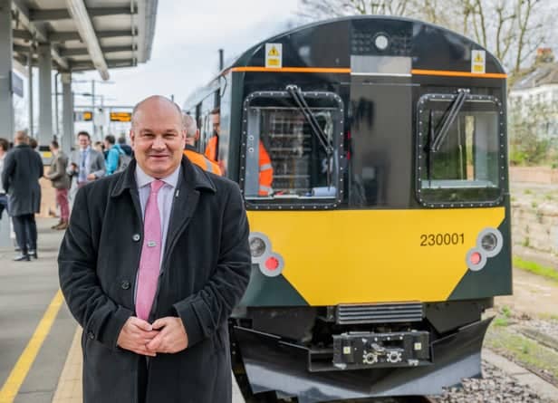GWR Managing Director Mark Hopwood beside the battery powered train