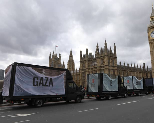 Campaigners have driven aid trucks through Westminster.