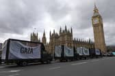 Campaigners have driven aid trucks through Westminster.