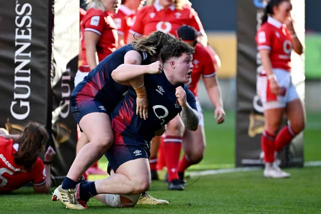 Hannah Botterman celebrates England's third try of the match as the Red Roses beat Wales 46-10