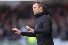 Nathan Jones looks to continue an unbeaten run against Wigan Athletic.