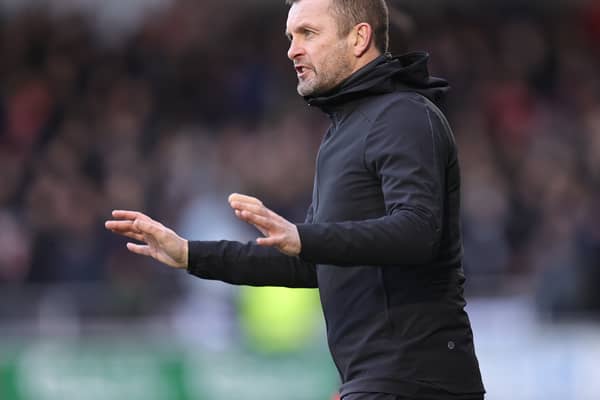 Nathan Jones looks to continue an unbeaten run against Wigan Athletic.