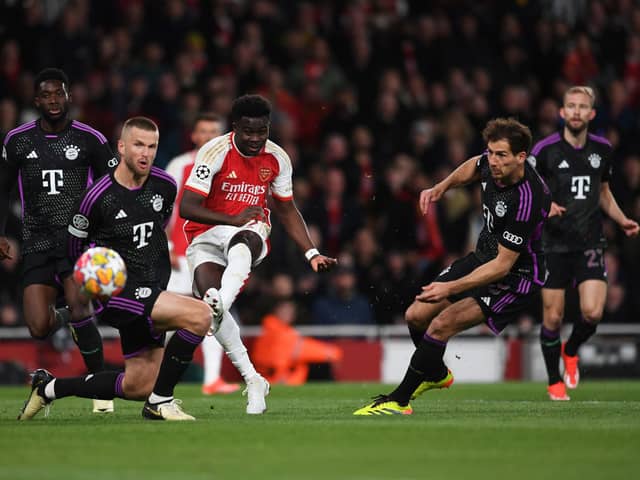 Bukayo Saka scores for Arsenal in Champions League quarter-final first leg