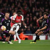 Bukayo Saka scores for Arsenal in Champions League quarter-final first leg
