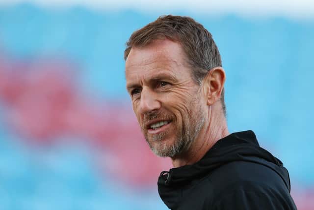 Gary Rowett brought Woods to Millwall on two loan spells.