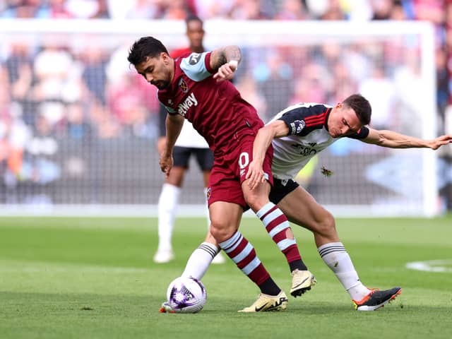 Lucas Paqueta in action against Fulham's Joao Palhina in 2-0 defeat to Irons. 