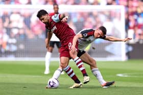Lucas Paqueta in action against Fulham's Joao Palhina in 2-0 defeat to Irons. 