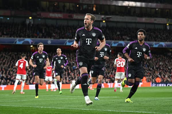 Harry Kane celebrates after scoring against Arsenal in first leg of UCL quarter-final