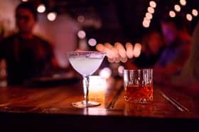 Speakeasy bars were first introduced during the Prohibition era in 1920s America when alcohol was illegal.
