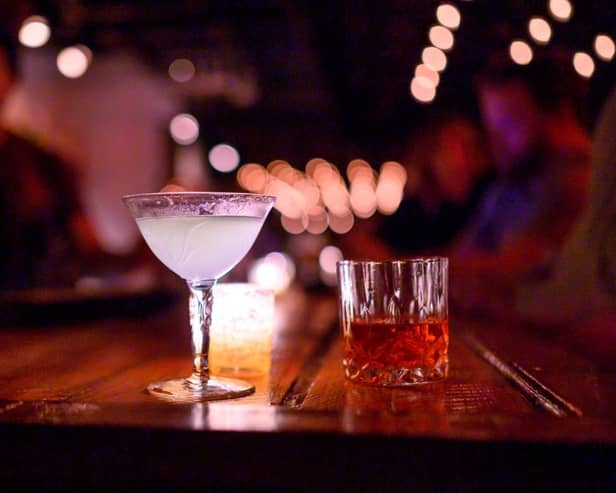 Speakeasy bars were first introduced during the Prohibition era in 1920s America when alcohol was illegal.