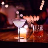 Speakeasy bars were first introduced during the Prohibition era in 1920s America when alcohol was illegal.