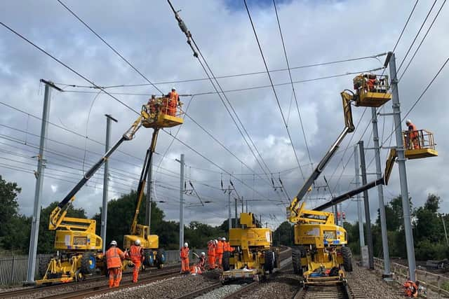 Engineers installing overhead lines as part of the Midland Mainline Upgrade