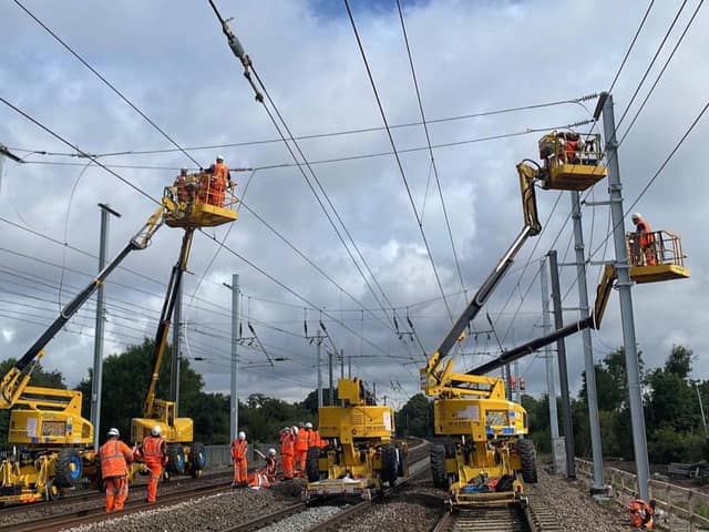 Engineers installing overhead lines as part of the Midland Mainline Upgrade