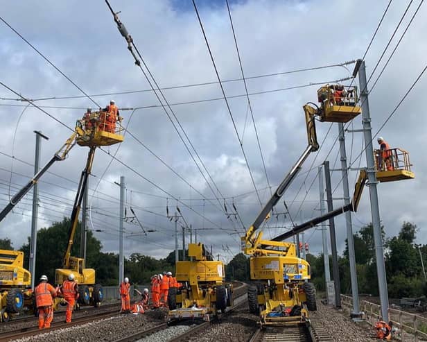Engineers installing overhead lines as part of the Midland Mainline Upgrade