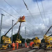 Engineers installing overhead lines as part of the Midland Mainline Upgrade