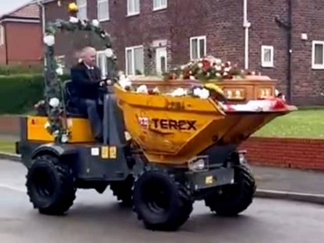 Dave Newton's funeral with his coffin in a dumper truck. 