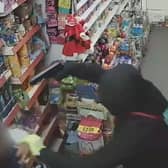 CCTV footage of an armed attack on a shop in Eltham