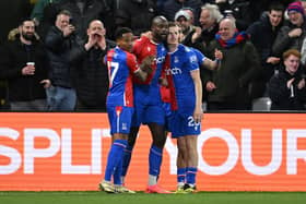 Palace celebrate with Jean-Philippe Mateta who scored both the Eagles' goals. 