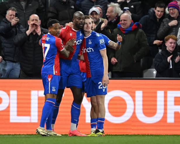 Palace celebrate with Jean-Philippe Mateta who scored both the Eagles' goals. 