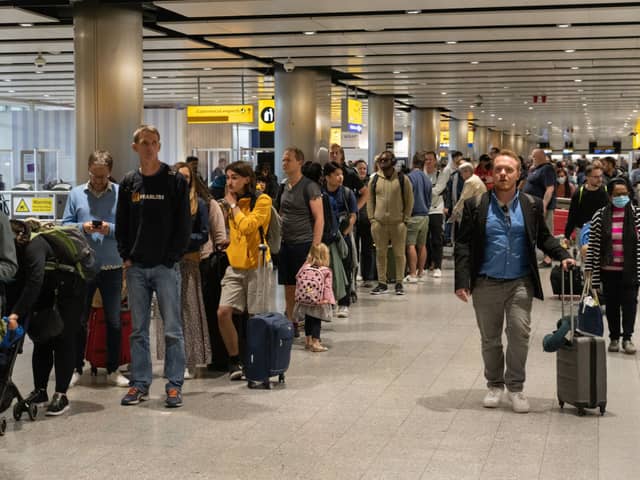 Travellers wait at Heathrow in 2022. 
