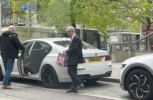 Nigel Farage pictured using a disabled parking bay for a 45-minute M&S shop. You can see the disabled writing in the bottom left. Credit: SWNS