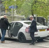 Nigel Farage pictured using a disabled parking bay for a 45-minute M&S shop. You can see the disabled writing in the bottom left. Credit: SWNS