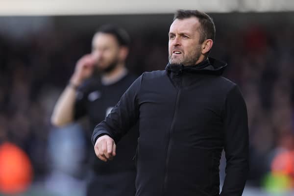 The Clarke-Harris links took place before the arrival of Nathan Jones.