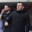 The Clarke-Harris links took place before the arrival of Nathan Jones.