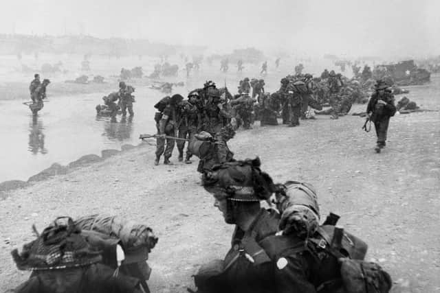British troops take positions on Sword beach during D-Day June 6 1944 after Allied forces stormed the Normandy beaches.