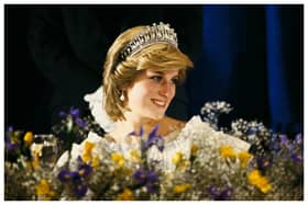 Diana, Princess of Wales, attended a banquet at the at the Hotel Nova Scotia on 15 June 1983 in Nova Scotia, Canada She wore acream satin dress by Gina Fratini and weari
 the Queen Mary Tiara.
